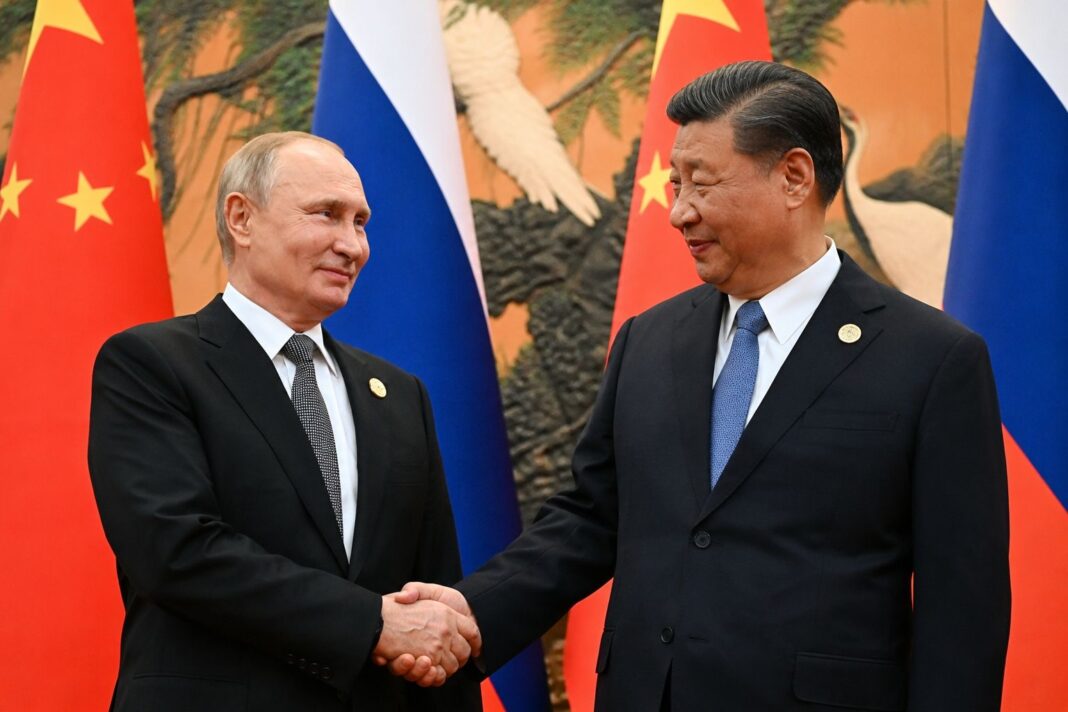 Xi